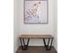 Entryway with a bench, artwork, and wood floors at 8106 Skye Glen St, Las Vegas, NV 89166