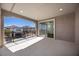 Covered patio featuring neighborhood views, sliding glass doors, and space for seating at 8106 Skye Glen St, Las Vegas, NV 89166