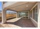 Covered patio with brick flooring, offering a comfortable outdoor living space at 8106 Skye Glen St, Las Vegas, NV 89166