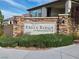Stone monument sign for the Eagle Ridge at Skye Canyon community, featuring decorative plants at 8106 Skye Glen St, Las Vegas, NV 89166