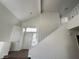 Bright foyer with high ceilings, natural light, and staircase leading to the second floor at 8166 Tone St, Las Vegas, NV 89123