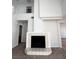 Bright and airy living room with a fireplace, lots of natural light, and tile flooring at 8166 Tone St, Las Vegas, NV 89123