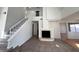Bright and airy living room with a fireplace, lots of natural light, and tile flooring at 8166 Tone St, Las Vegas, NV 89123