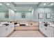 Elegant bathroom with dual sinks, modern fixtures, and a relaxing soaking tub at 8390 Carmel Ridge Ct, Las Vegas, NV 89113