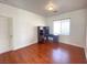 Spacious bedroom with hardwood flooring and a large window at 8576 Peaceful Dreams St, Las Vegas, NV 89139