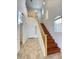 Grand entryway featuring high ceilings, tile flooring, staircase, and a stunning chandelier at 8576 Peaceful Dreams St, Las Vegas, NV 89139