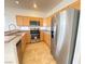 Bright kitchen featuring granite countertops, stainless steel appliances, and ample cabinet space at 8576 Peaceful Dreams St, Las Vegas, NV 89139