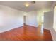 Large main bedroom with hardwood floors and en suite bathroom at 8576 Peaceful Dreams St, Las Vegas, NV 89139