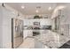 Bright, functional kitchen with granite countertops and stainless steel appliances at 9020 Loggers Mill Ave, Las Vegas, NV 89143