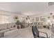 Spacious living room furnished with plush sofas and window at 9020 Loggers Mill Ave, Las Vegas, NV 89143
