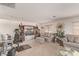 Spacious living room furnished with plush sofas and window at 9020 Loggers Mill Ave, Las Vegas, NV 89143