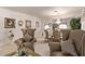 Open living room and dining area with neutral tones and decor at 9020 Loggers Mill Ave, Las Vegas, NV 89143