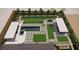 Overhead rendering of a backyard with a pool, grass, cornhole and eating area at 9930 Zakos Ct, Las Vegas, NV 89149