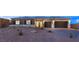 Beautiful single-story home with two-car garage and desert landscaping at 9930 Zakos Ct, Las Vegas, NV 89149