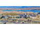 Aerial view of a Primary-planned community with lake views and abundant amenities at 101 Mirage View Dr, Henderson, NV 89011