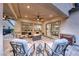 Covered patio with ample seating and fire pit at 101 Mirage View Dr, Henderson, NV 89011