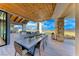 Inviting covered patio with stone columns and mountain views, ideal for outdoor dining and entertaining at 101 Mirage View Dr, Henderson, NV 89011