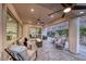 Covered patio with ample seating and fire pit at 101 Mirage View Dr, Henderson, NV 89011