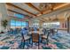 Bright dining area with mountain views, elegant tables and chairs, perfect for community gatherings at 101 Mirage View Dr, Henderson, NV 89011
