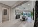 Charming dining room features a modern chandelier, an elegant buffet, and views of the outdoor living at 101 Mirage View Dr, Henderson, NV 89011