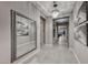 Foyer with a large mirror, tile flooring, and decorative lighting creating an open and airy feel at 101 Mirage View Dr, Henderson, NV 89011