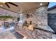 Outdoor kitchen with stainless steel grill and granite countertops at 101 Mirage View Dr, Henderson, NV 89011