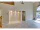 Spacious living room with tiled floor, recessed lighting, and high ceilings at 10311 Birch Bluff Ln, Las Vegas, NV 89145