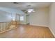 Loft space with light laminate floors, stair access, and bright walls at 10311 Birch Bluff Ln, Las Vegas, NV 89145