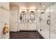 Elegant bathroom featuring double sinks, modern vanity, and a stylish glass-enclosed shower at 10476 Tyler Park Ave, Las Vegas, NV 89135