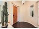 Inviting foyer featuring hardwood floors, a cactus, and decorative niche at 10476 Tyler Park Ave, Las Vegas, NV 89135