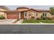 Charming single-story home with a well-maintained front yard and a two car garage at 10476 Tyler Park Ave, Las Vegas, NV 89135