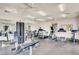 Spacious gym with multiple exercise machines, offering a convenient fitness space for residents at 10476 Tyler Park Ave, Las Vegas, NV 89135