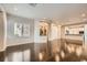 Bright living area with recessed lights, hardwood floors, and a view to the kitchen at 10476 Tyler Park Ave, Las Vegas, NV 89135