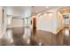 Expansive living area featuring hardwood floors, recessed lighting, and large windows at 10476 Tyler Park Ave, Las Vegas, NV 89135