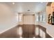 Spacious living room boasting recessed lighting, hardwood floors, and plantation shutters at 10476 Tyler Park Ave, Las Vegas, NV 89135