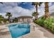 Inviting community pool area with palm trees, offering a refreshing oasis for relaxation and recreation at 10476 Tyler Park Ave, Las Vegas, NV 89135