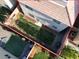 Aerial view of the backyard with grass, patio, hardscape, and a red outline at 10608 Kennedy Peak Ln, Las Vegas, NV 89166