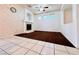 Cozy living room featuring a fireplace, tile, and carpet flooring at 1080 Laguna Park Ct, Las Vegas, NV 89110