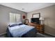 Bedroom with plush carpet and a dresser at 11092 Abbeyfield Rose Dr, Henderson, NV 89052