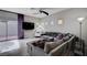 Comfortable living room with ceiling fan, modern decor and plenty of natural light at 11092 Abbeyfield Rose Dr, Henderson, NV 89052