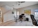 Office space features modern furnishings and wood-look flooring at 11092 Abbeyfield Rose Dr, Henderson, NV 89052