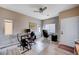 Office area features wood-look flooring, a ceiling fan, and great lighting at 11092 Abbeyfield Rose Dr, Henderson, NV 89052