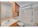 Bathroom featuring a vanity, medicine cabinet, toilet, and shower over tub combination at 1292 Dalene Ave, Henderson, NV 89002