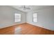 Bedroom with hardwood floors, ceiling fan, and natural light at 1292 Dalene Ave, Henderson, NV 89002