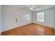 Bedroom with hardwood floors, ceiling fan, and ample closet space at 1292 Dalene Ave, Henderson, NV 89002