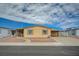 Charming single-story home with a well-maintained yard and covered parking at 1292 Dalene Ave, Henderson, NV 89002