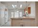 Bright kitchen with modern appliances, breakfast bar, and lots of natural light at 1292 Dalene Ave, Henderson, NV 89002