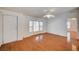 Inviting living room featuring hardwood flooring, large windows, and ample natural light at 1292 Dalene Ave, Henderson, NV 89002