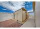 Backyard shed, featuring desert landscaping and walkway at 1292 Dalene Ave, Henderson, NV 89002