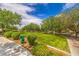 Beautiful community park with green space, mature trees, and walking paths at 1634 Clint Canyon Dr, Henderson, NV 89002